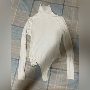 HALARA White Ribbed Turtleneck Long-Sleeve Bodysuit